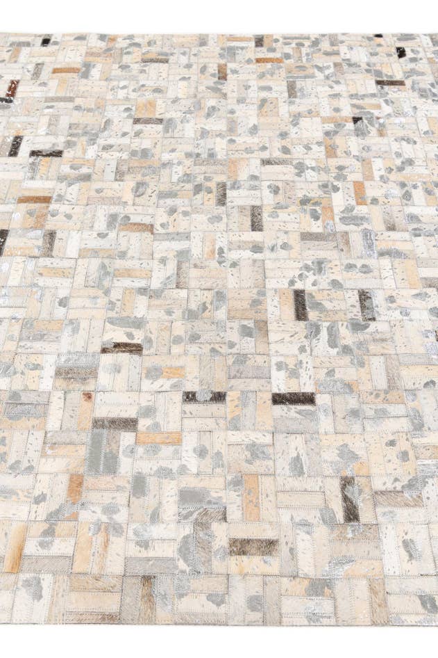 Detail image of 4' 11 x 8' 1 Cowhide Stocks Rug