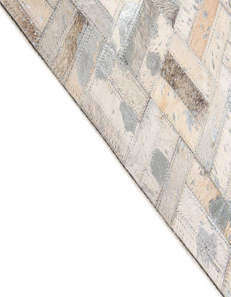 Detail image of 4' 11 x 8' 1 Cowhide Stocks Rug