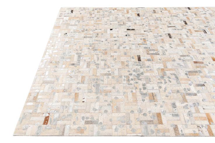 Detail image of 4' 11 x 8' 1 Cowhide Stocks Rug