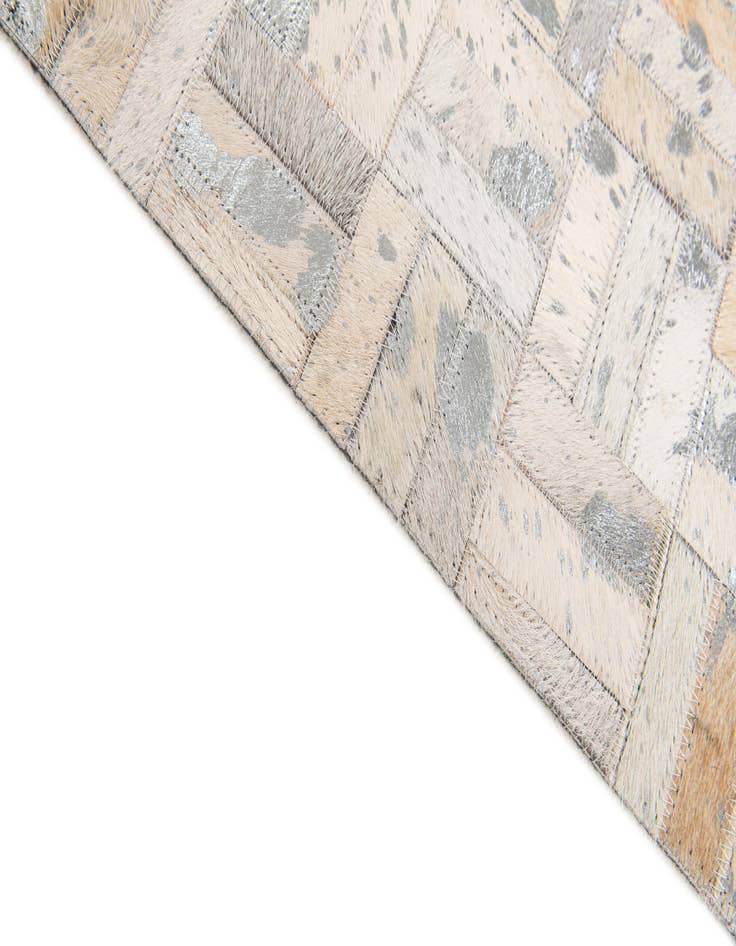 Detail image of 4' 11 x 8' 1 Cowhide Stocks Rug