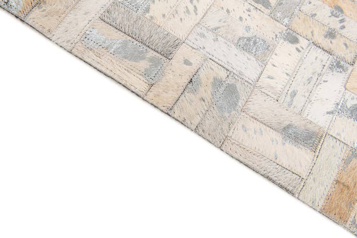 Detail image of 4' 11 x 8' 1 Cowhide Stocks Rug