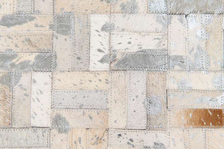 4' 11 x 8' 1 Cowhide Stocks Rug