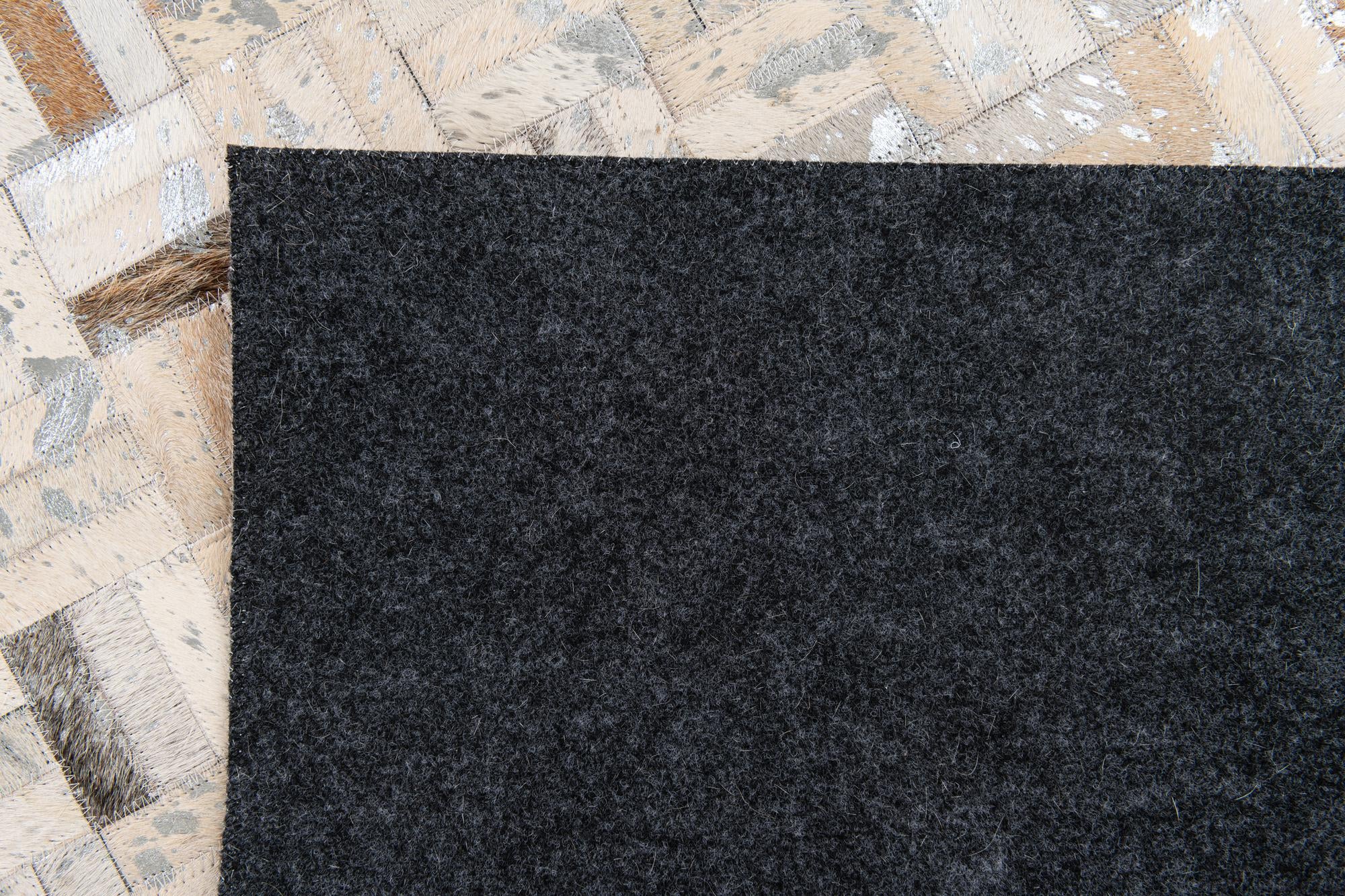 4' 11 x 8' 1 Cowhide Stocks Rug