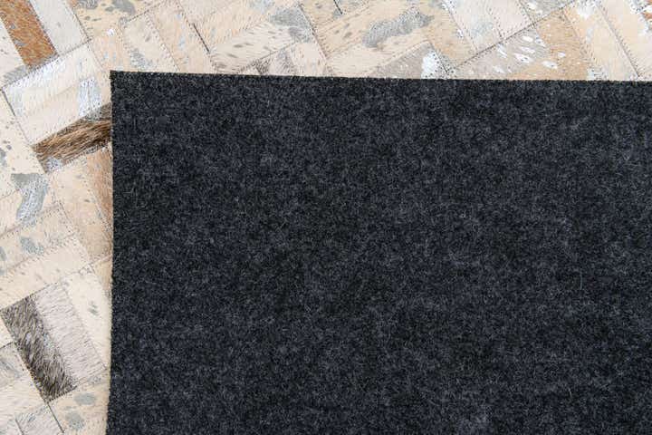 4' 11 x 8' 1 Cowhide Stocks Rug