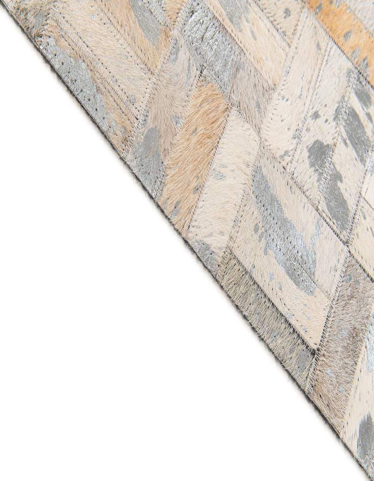 Detail image of 4' 11 x 8' 1 Cowhide Stocks Rug