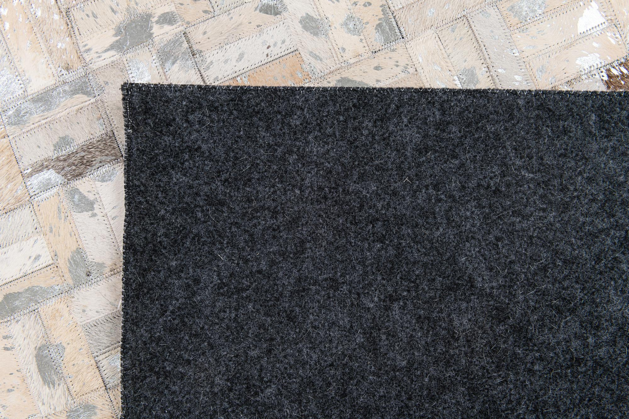 4' 11 x 8' 1 Cowhide Stocks Rug