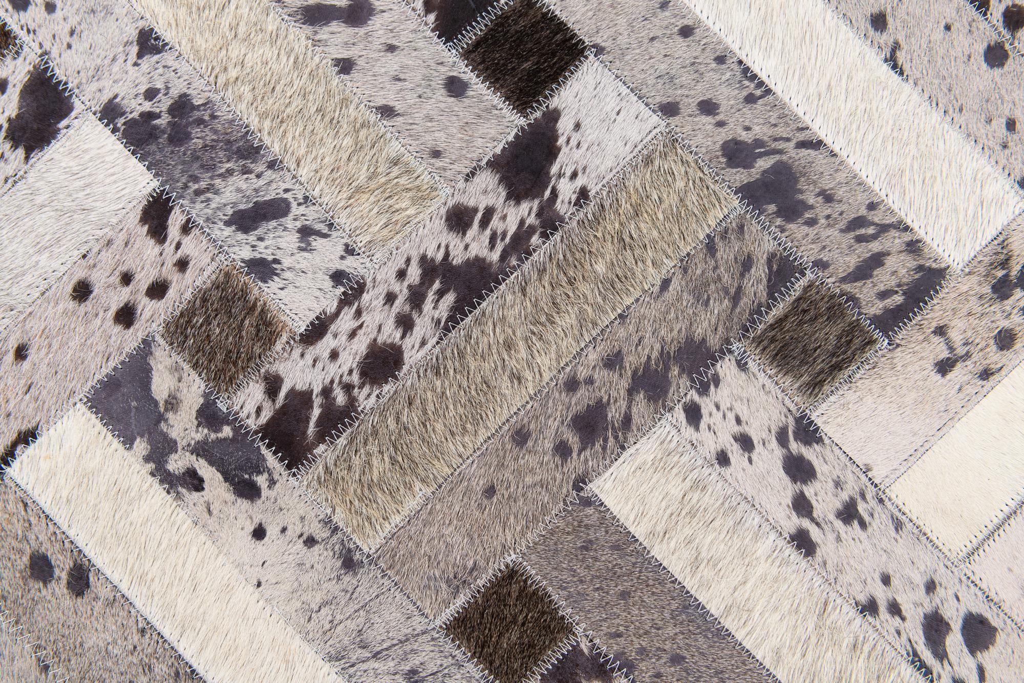 5' x 8' Cowhide Stocks Rug