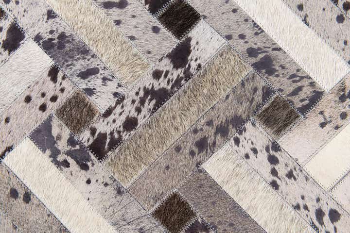 5' x 8' Cowhide Stocks Rug