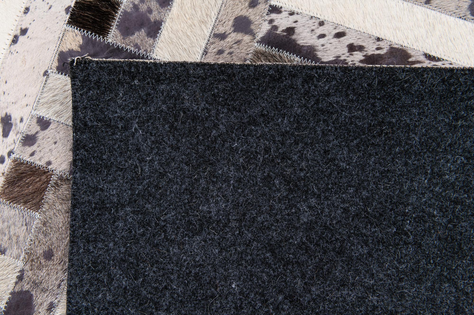5' x 8' Cowhide Stocks Rug