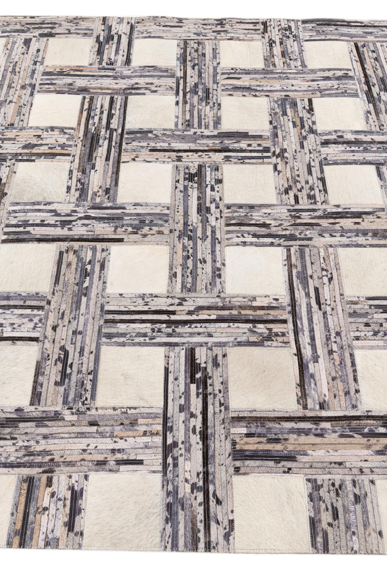 4' 11 x 7' 8 Cowhide Stocks Rug
