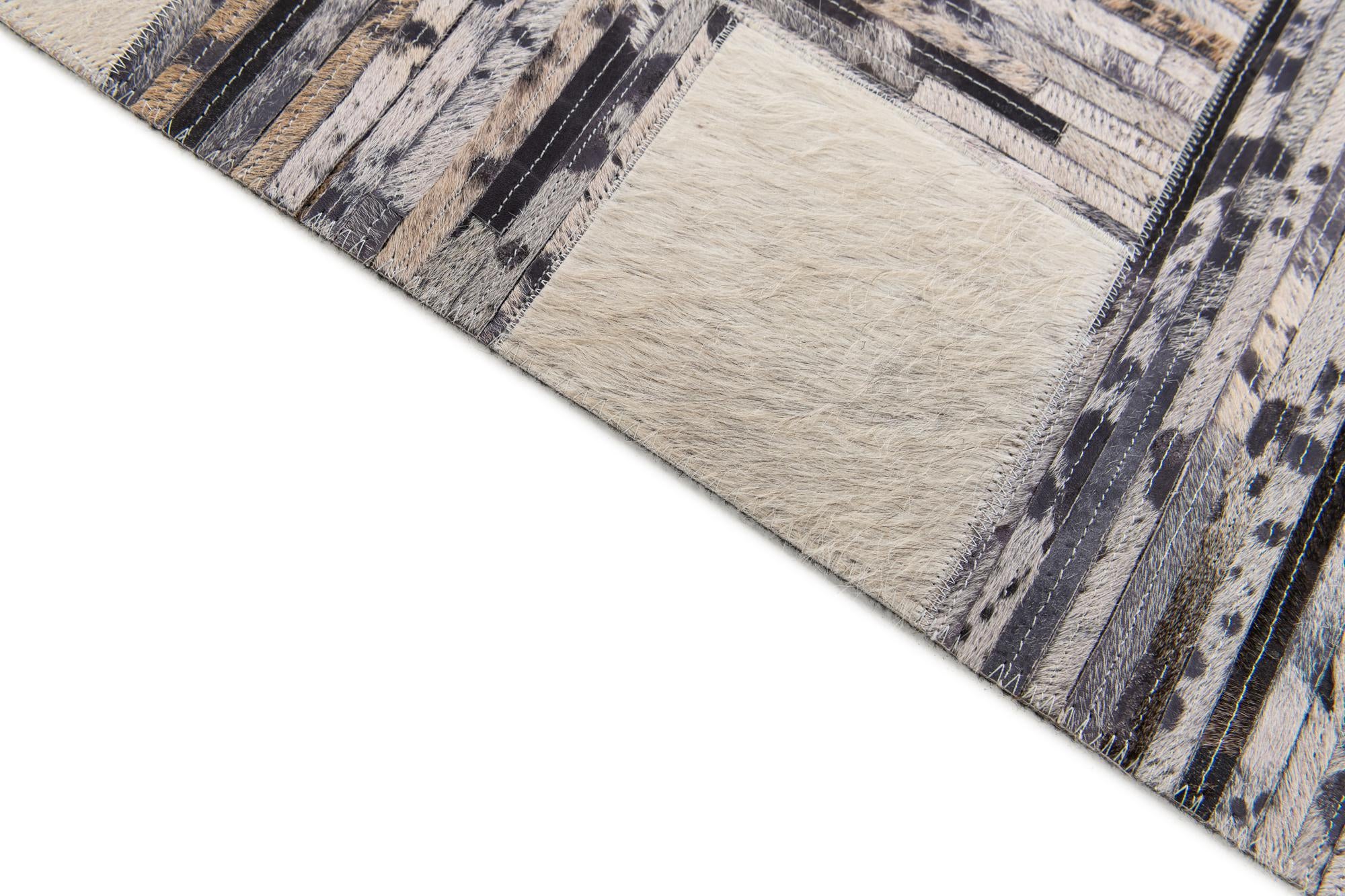 4' 11 x 7' 8 Cowhide Stocks Rug