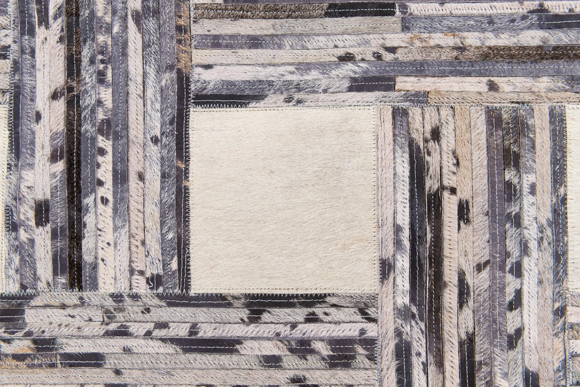 4' 11 x 7' 8 Cowhide Stocks Rug