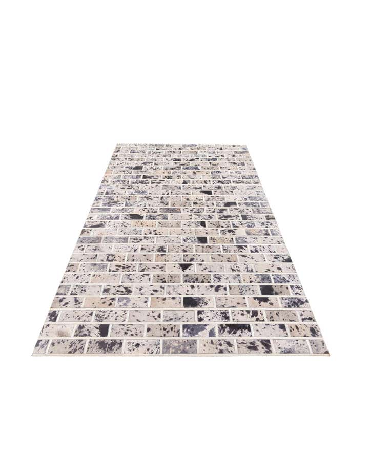 5' 1 x 8' 2 Cowhide Stocks Rug