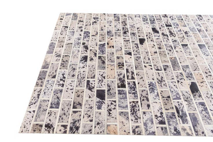 Detail image of 5' 1 x 8' 2 Cowhide Stocks Rug