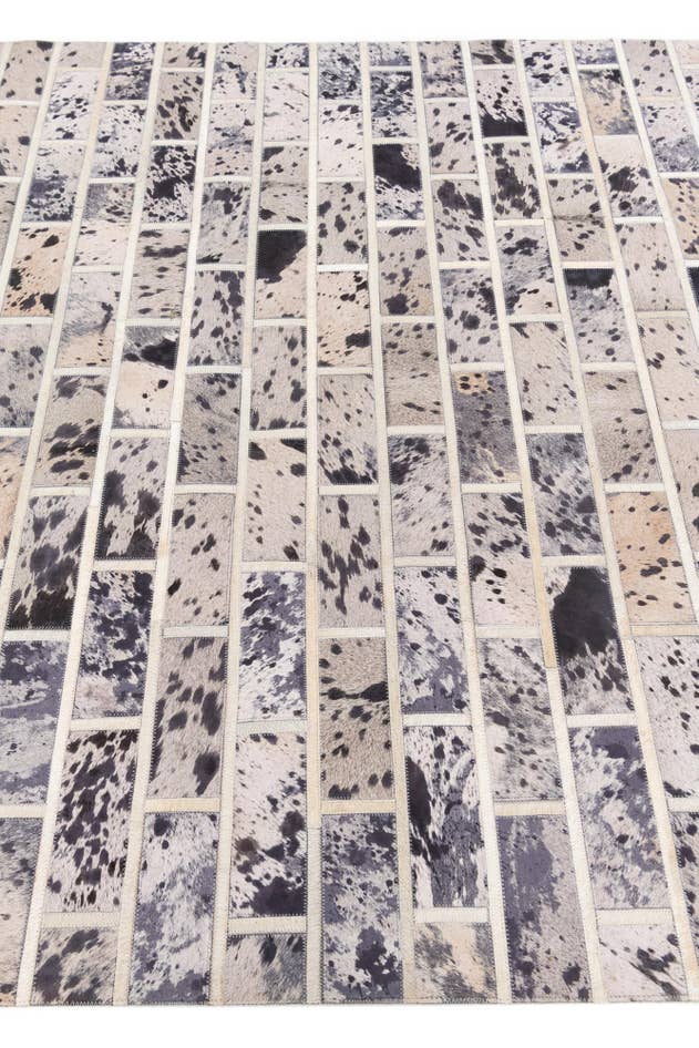 Detail image of 5' 1 x 8' 2 Cowhide Stocks Rug