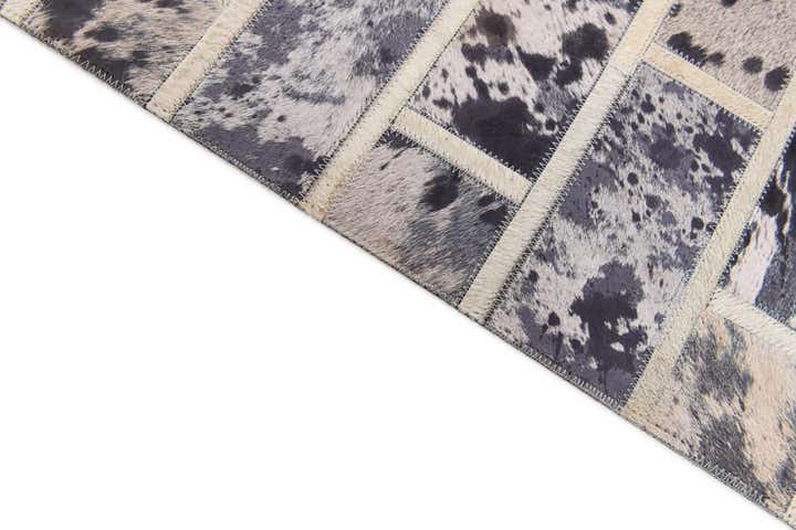5' 1 x 8' 2 Cowhide Stocks Rug
