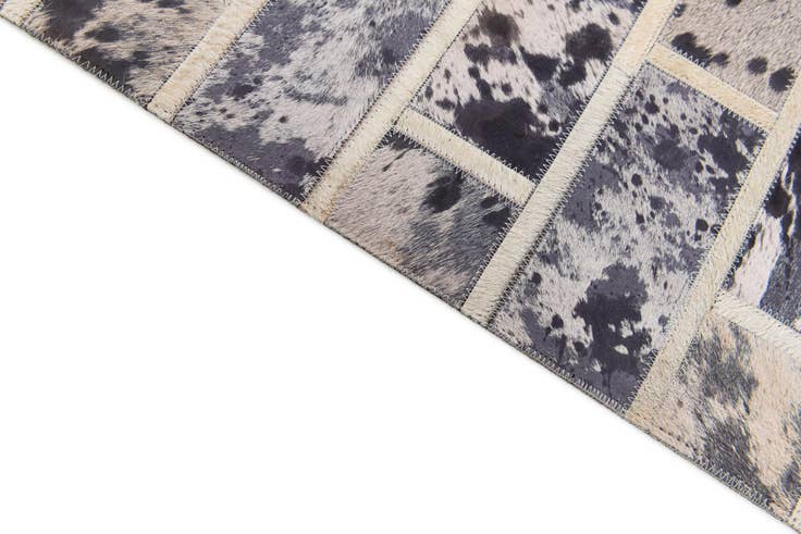 Detail image of 5' 1 x 8' 2 Cowhide Stocks Rug