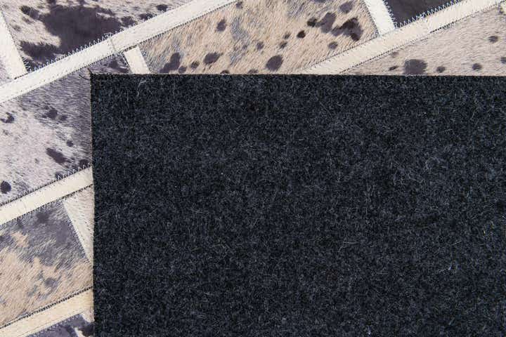 5' 1 x 8' 2 Cowhide Stocks Rug