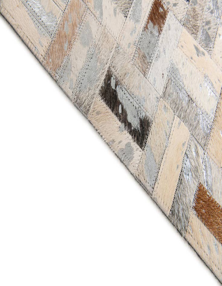 Detail image of 5' x 7' 11 Cowhide Stocks Rug