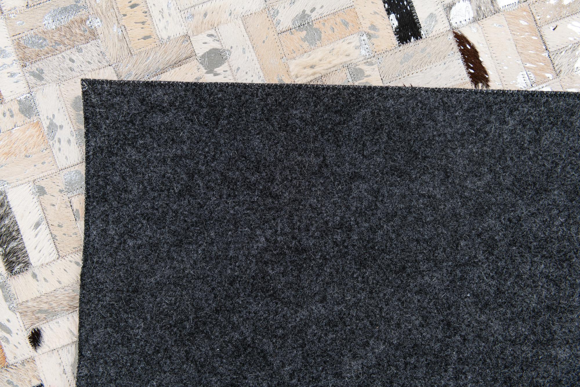 5' x 7' 11 Cowhide Stocks Rug