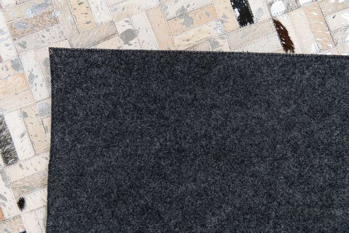 5' x 7' 11 Cowhide Stocks Rug