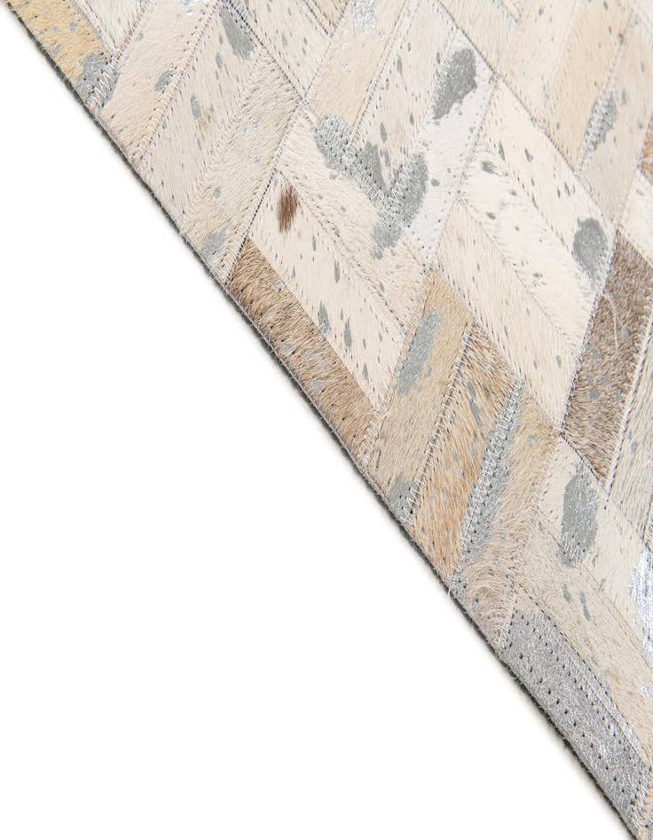 Detail image of 4' 11 x 8' Cowhide Stocks Rug