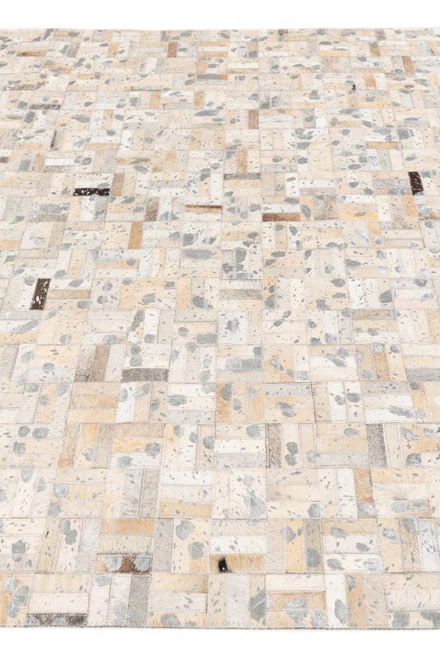 Detail image of 4' 11 x 8' 1 Cowhide Stocks Rug