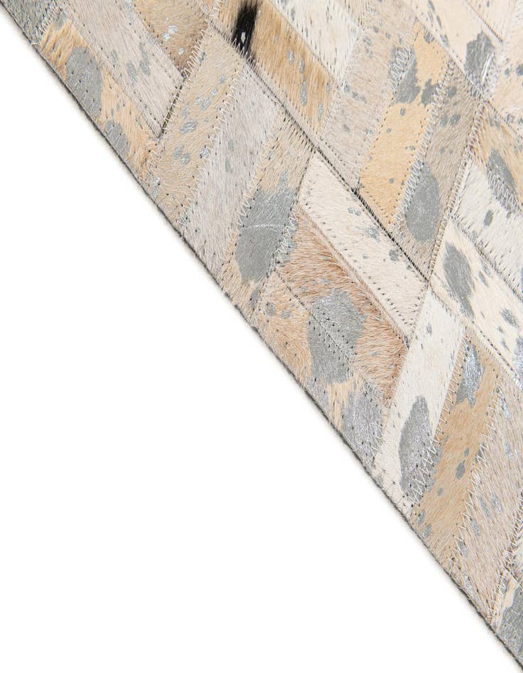 Detail image of 4' 11 x 8' 1 Cowhide Stocks Rug