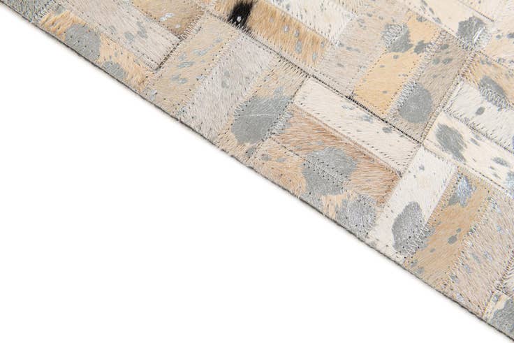 Detail image of 4' 11 x 8' 1 Cowhide Stocks Rug