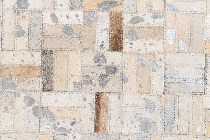 4' 11 x 8' 1 Cowhide Stocks Rug