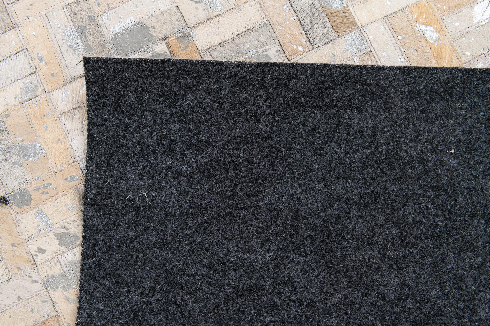 4' 11 x 8' 1 Cowhide Stocks Rug
