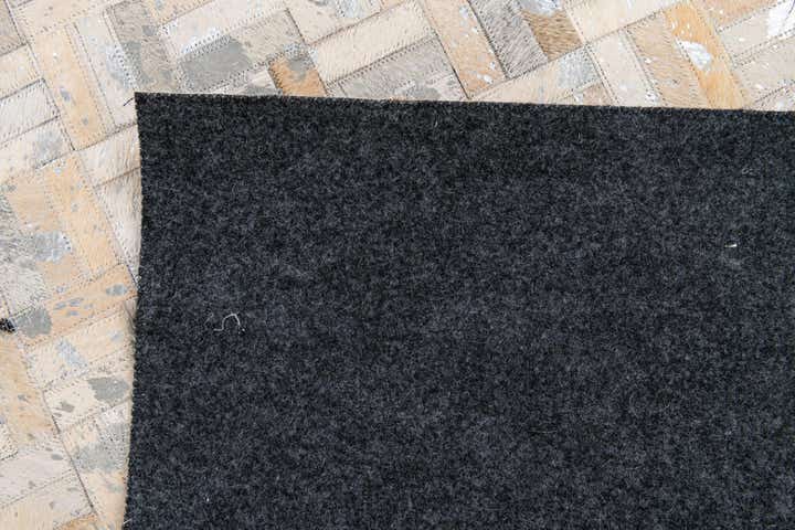 4' 11 x 8' 1 Cowhide Stocks Rug