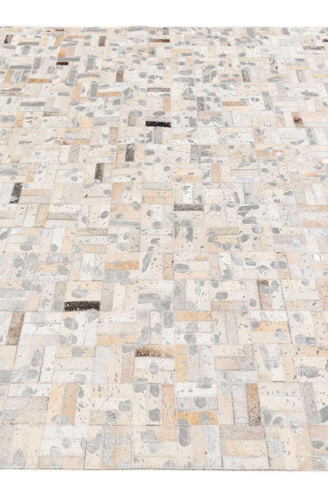 4' 11 x 8' 1 Cowhide Stocks Rug