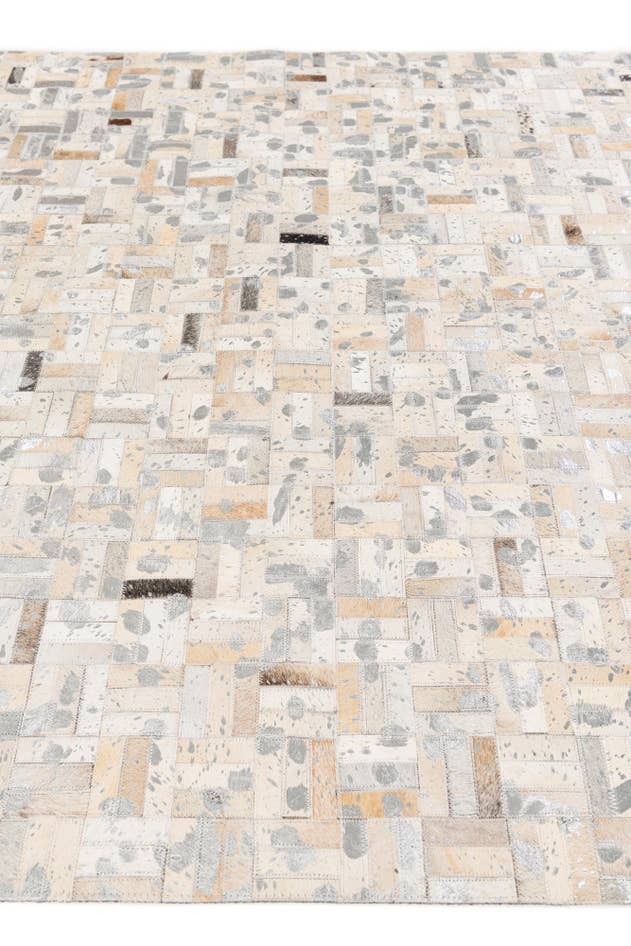 Detail image of 4' 11 x 8' 1 Cowhide Stocks Rug