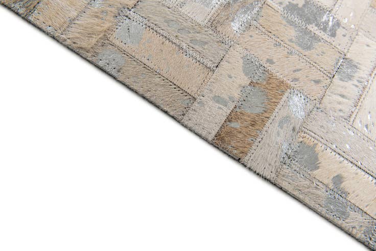 Detail image of 4' 11 x 8' 1 Cowhide Stocks Rug