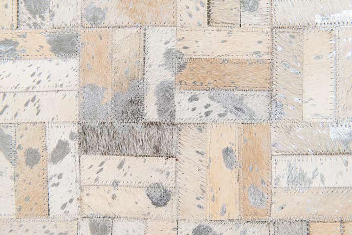 4' 11 x 8' 1 Cowhide Stocks Rug