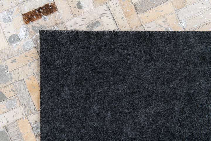 4' 11 x 8' 1 Cowhide Stocks Rug