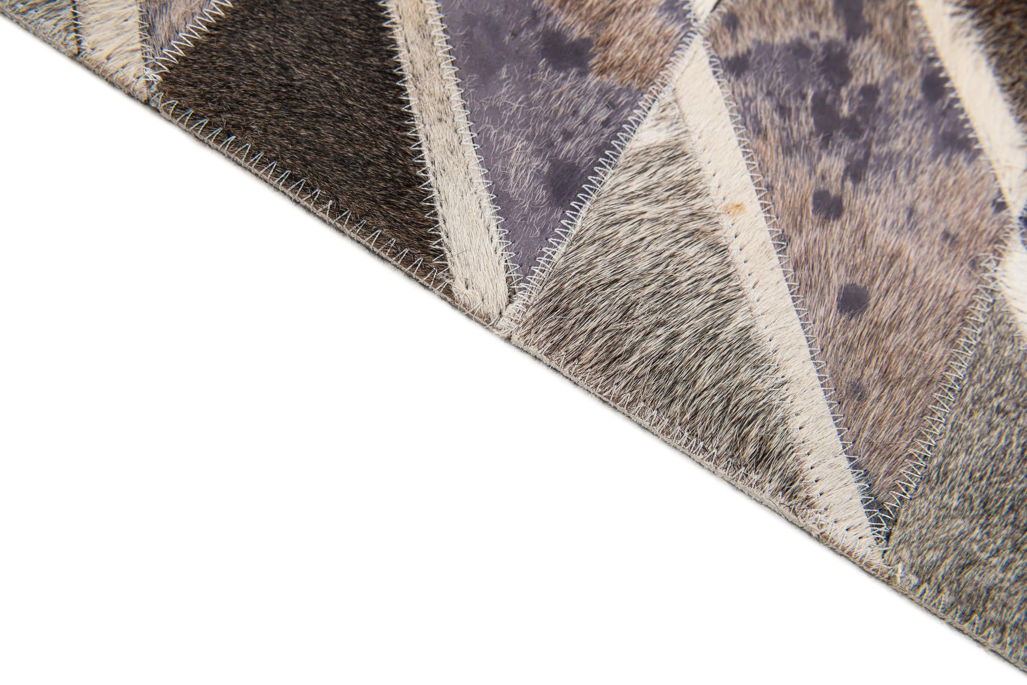 5' x 7' 10 Cowhide Stocks Rug