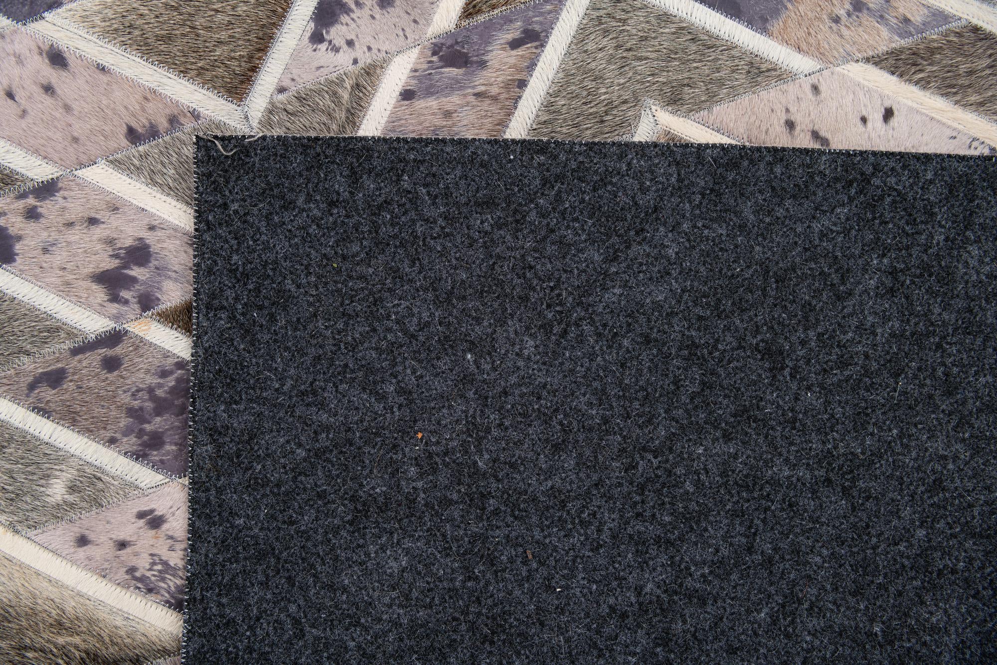 5' x 7' 10 Cowhide Stocks Rug