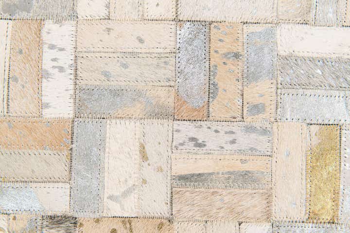 5' x 7' 10 Cowhide Stocks Rug
