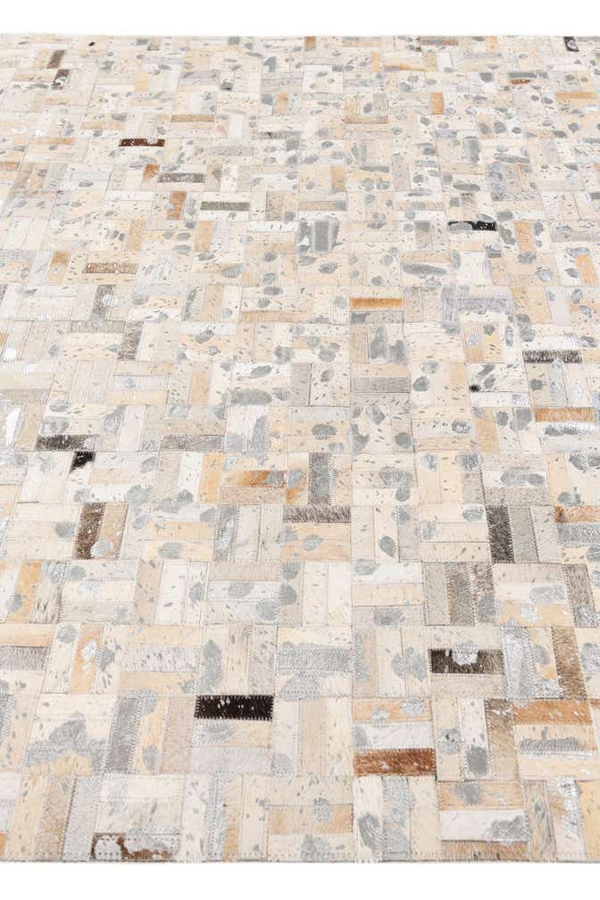 4' 11 x 8' 1 Cowhide Stocks Rug