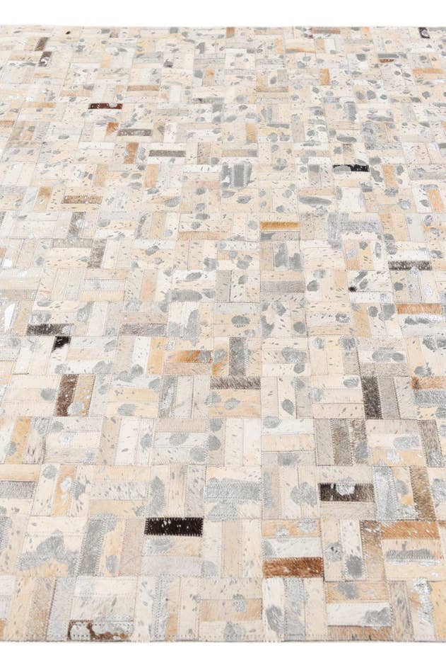 Detail image of 4' 11 x 8' 1 Cowhide Stocks Rug