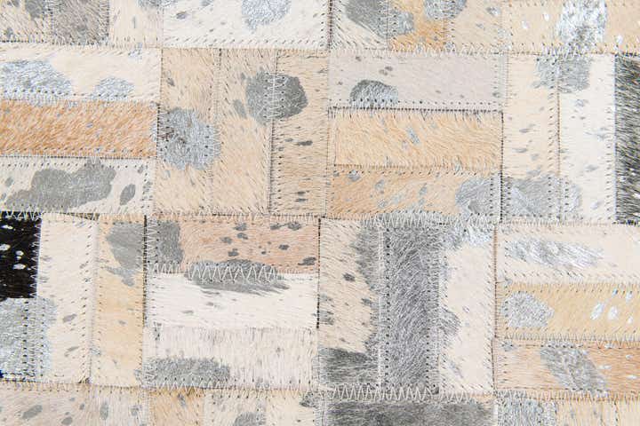 4' 11 x 8' 1 Cowhide Stocks Rug