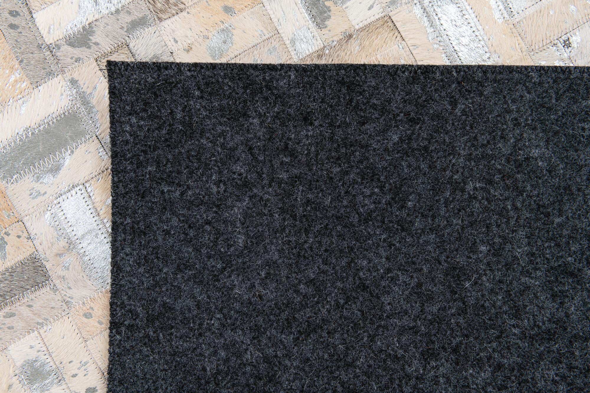 4' 11 x 8' 1 Cowhide Stocks Rug