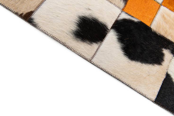 Detail image of 5' 1 x 8' 1 Cowhide Stocks Rug