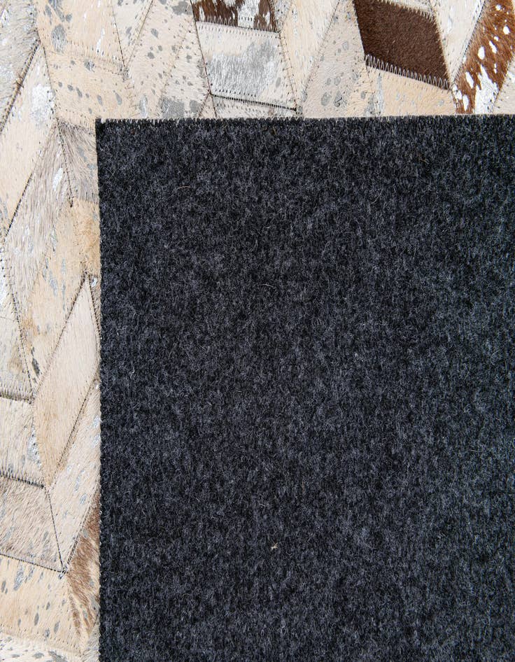 Detail image of 5' 3 x 7' 6 Cowhide Stocks Rug