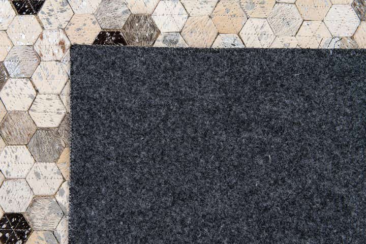 5' 4 x 7' 7 Cowhide Stocks Rug