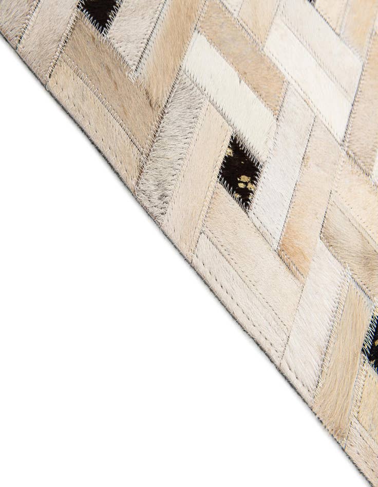 Detail image of 5' 1 x 8' Cowhide Stocks Rug