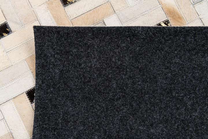 5' 1 x 8' Cowhide Stocks Rug