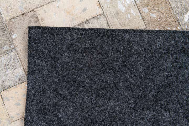 4' 9 x 6' 10 Cowhide Stocks Rug